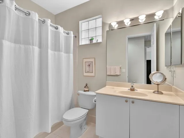 an aerial view of a house with yard swimming pool and outdoor seating