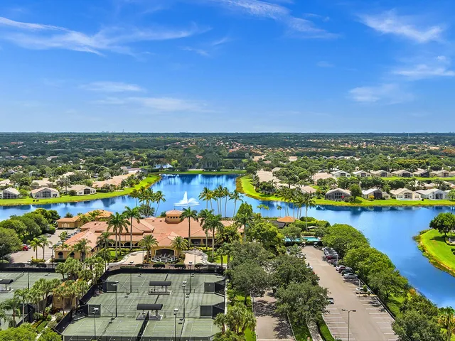 a view of a balcony with chairs