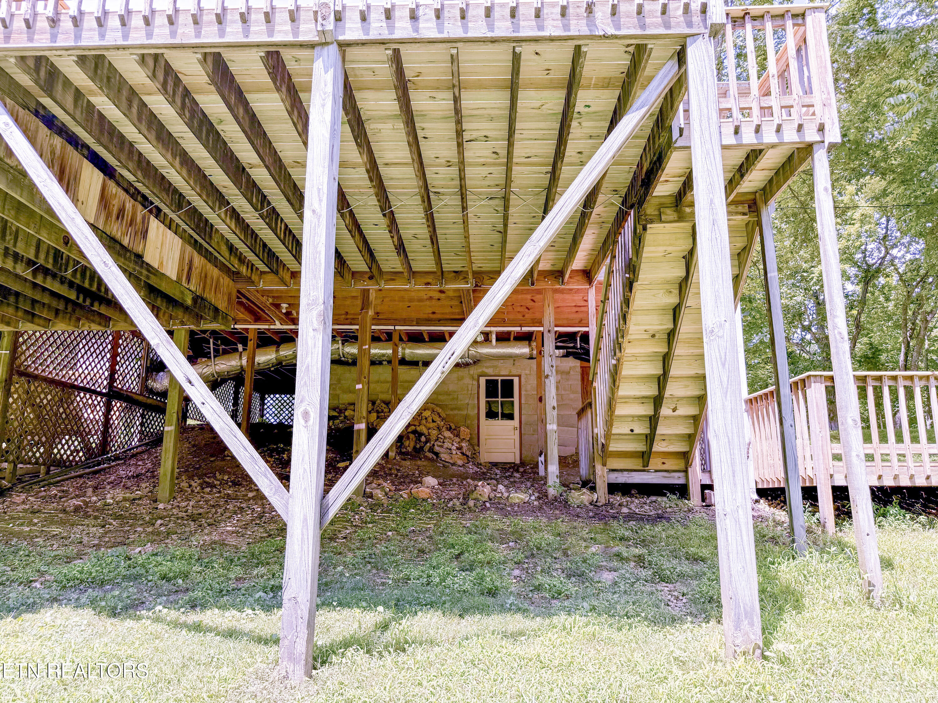 676 Sunny Point Road Baxter, TN 38544 - Photo 22 of 38 Under the Deck