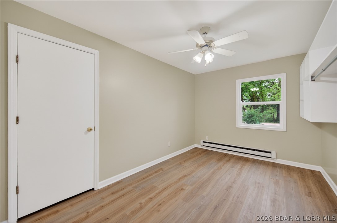 177 Storage Road Eldon, MO 65026 - Photo 21 of 34 Guest bedroom 1- Features built-in shelving, as we