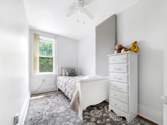 an outdoor view of patio with umbrella