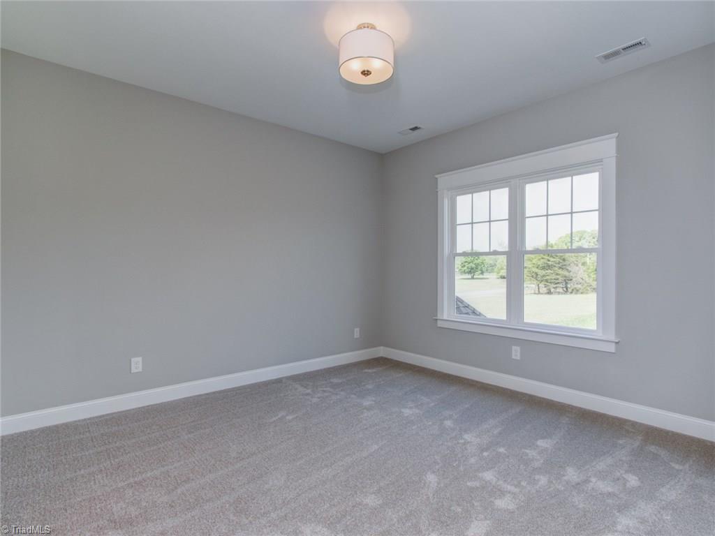 7303 Lanval Drive Oak Ridge, NC 27310 - Photo 28 of 30