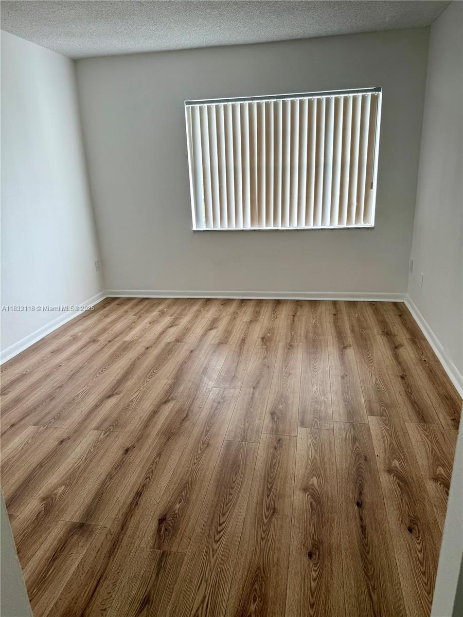 492 Northwest 165th Street, Unit C609 Miami, FL 33169 - Photo 11 of 17