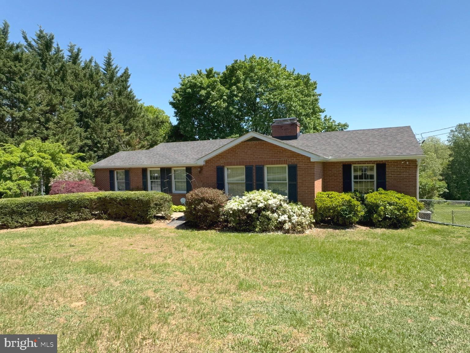 4215 Buffalo Road Mount Airy, MD 21771 - Photo 1 of 44 a front view of a house with yard and green space