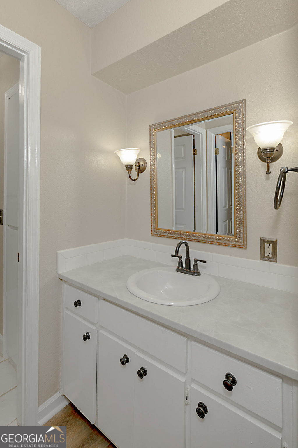 6101 River Road, Unit 2 Columbus, GA 31904 - Photo 20 of 27 a bathroom with a sink and a mirror
