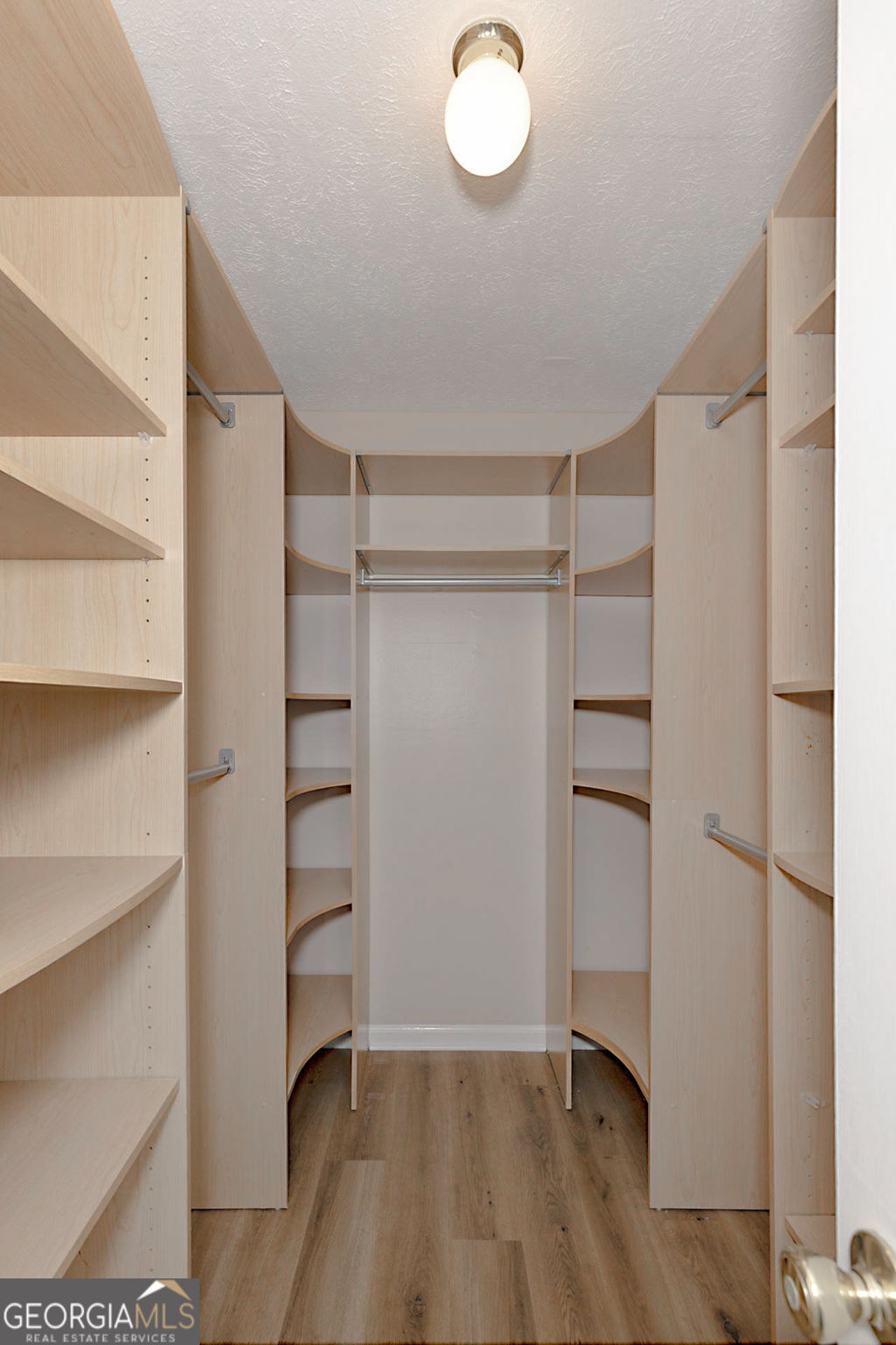 6101 River Road, Unit 2 Columbus, GA 31904 - Photo 21 of 27 a view of walk in closet with empty racks