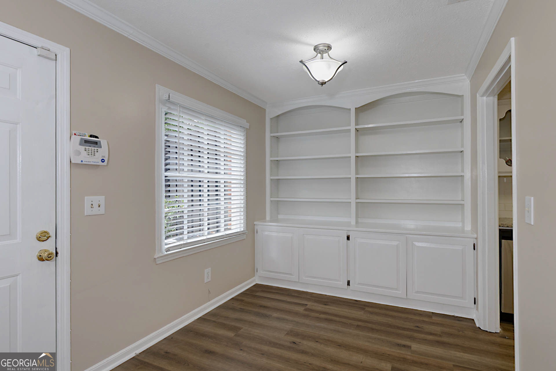 6101 River Road, Unit 2 Columbus, GA 31904 - Photo 5 of 27 a view of an empty room with a window