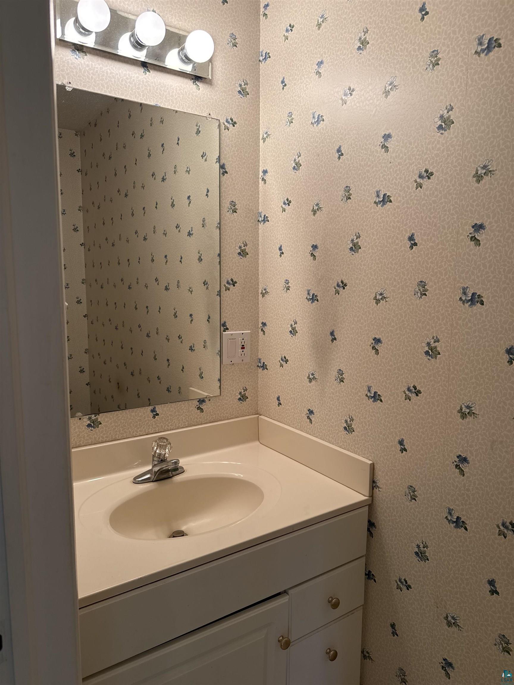 870 Chebomnicon Bay Road La Pointe, WI 54850 - Photo 27 of 53 1/4 bathroom on the main floor