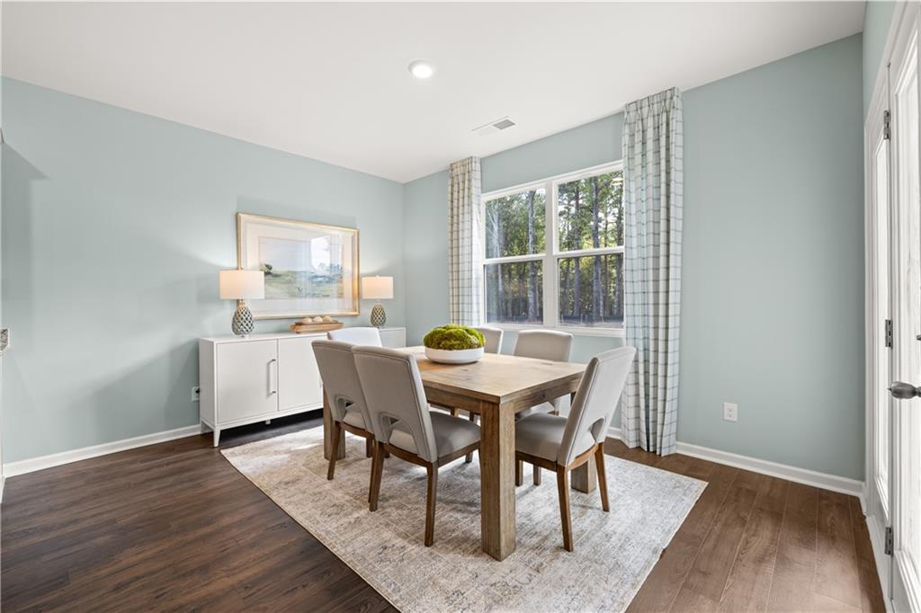 1171 Amerson Street Buckhead, GA 30625 - Photo 11 of 51 a dining room with furniture and wooden floor