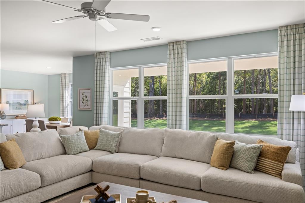 1171 Amerson Street Buckhead, GA 30625 - Photo 21 of 51 a living room with furniture and a large window