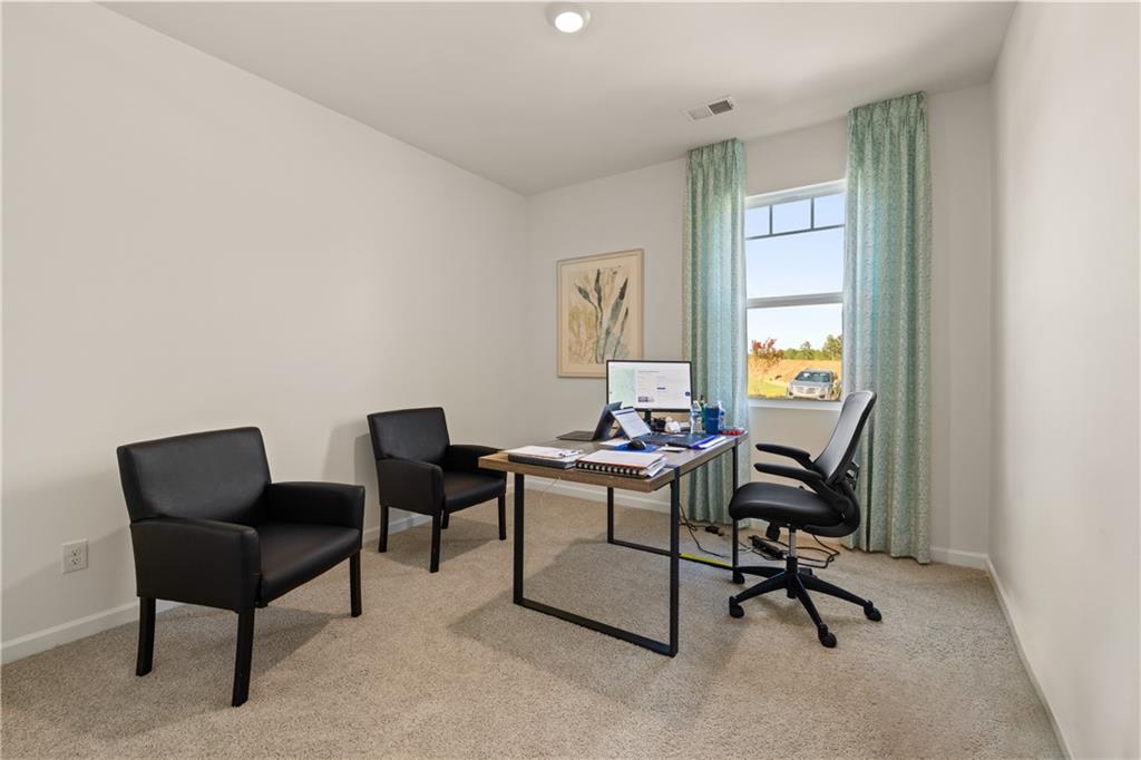 1171 Amerson Street Buckhead, GA 30625 - Photo 45 of 51 a view of a workspace with furniture and a window