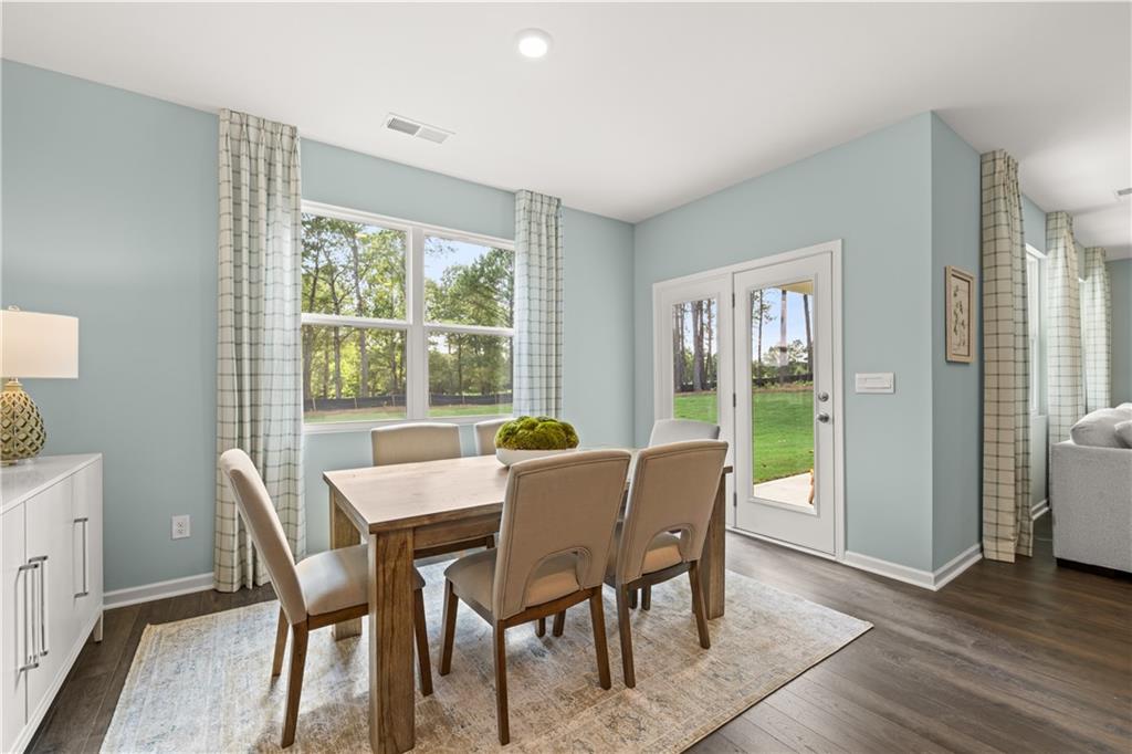 1171 Amerson Street Buckhead, GA 30625 - Photo 10 of 51 a dining room with furniture window wooden floor