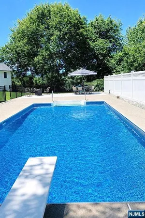 a view of a building with a yard