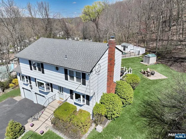 a aerial view of a house with a patio
