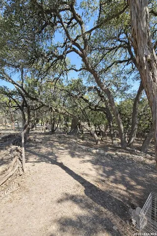 a view of a yard covered with snow