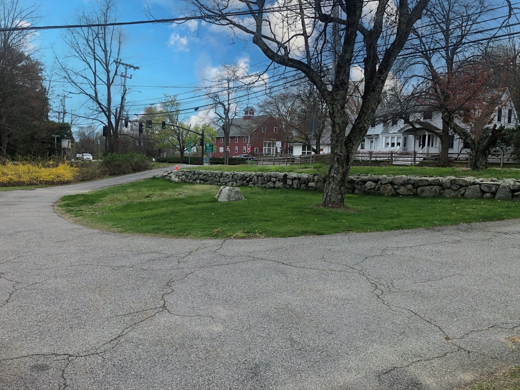 166 Spring Street Lexington, MA 02421 - Photo 2 of 8 a view of a park with large trees