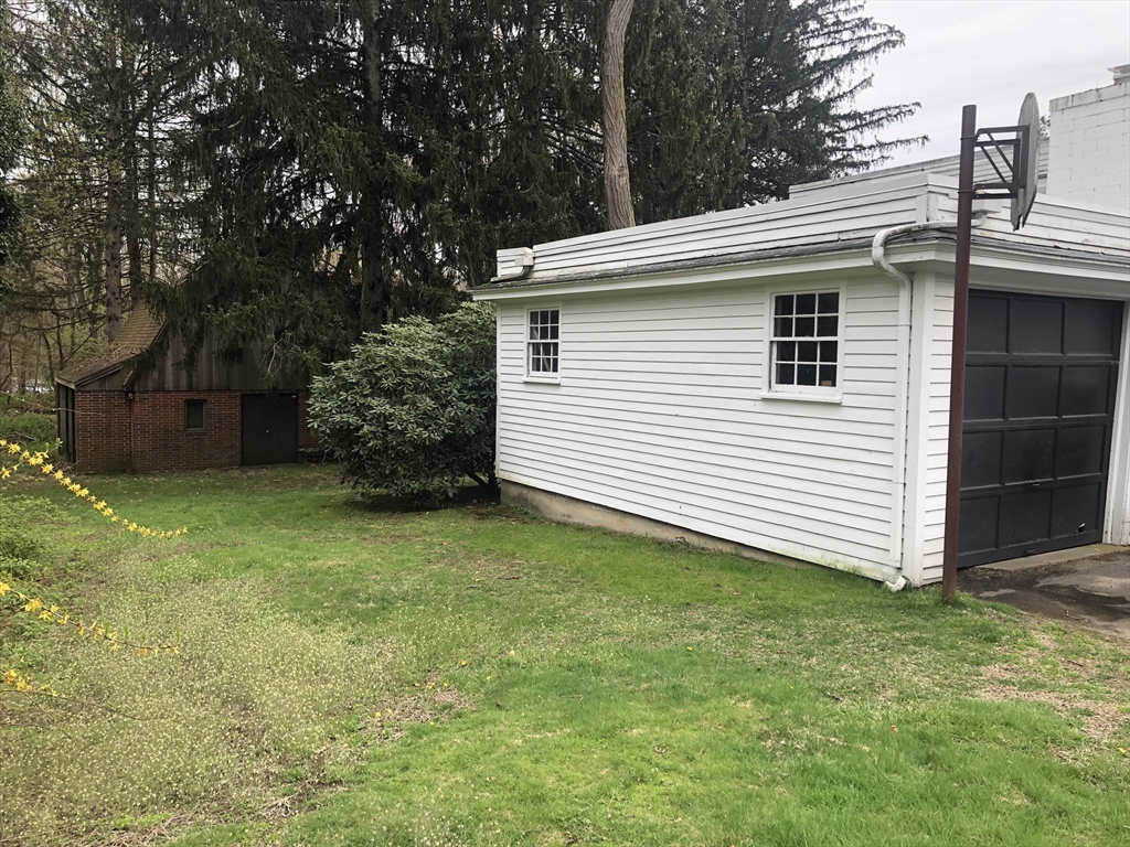 166 Spring Street Lexington, MA 02421 - Photo 3 of 8 a view of a backyard