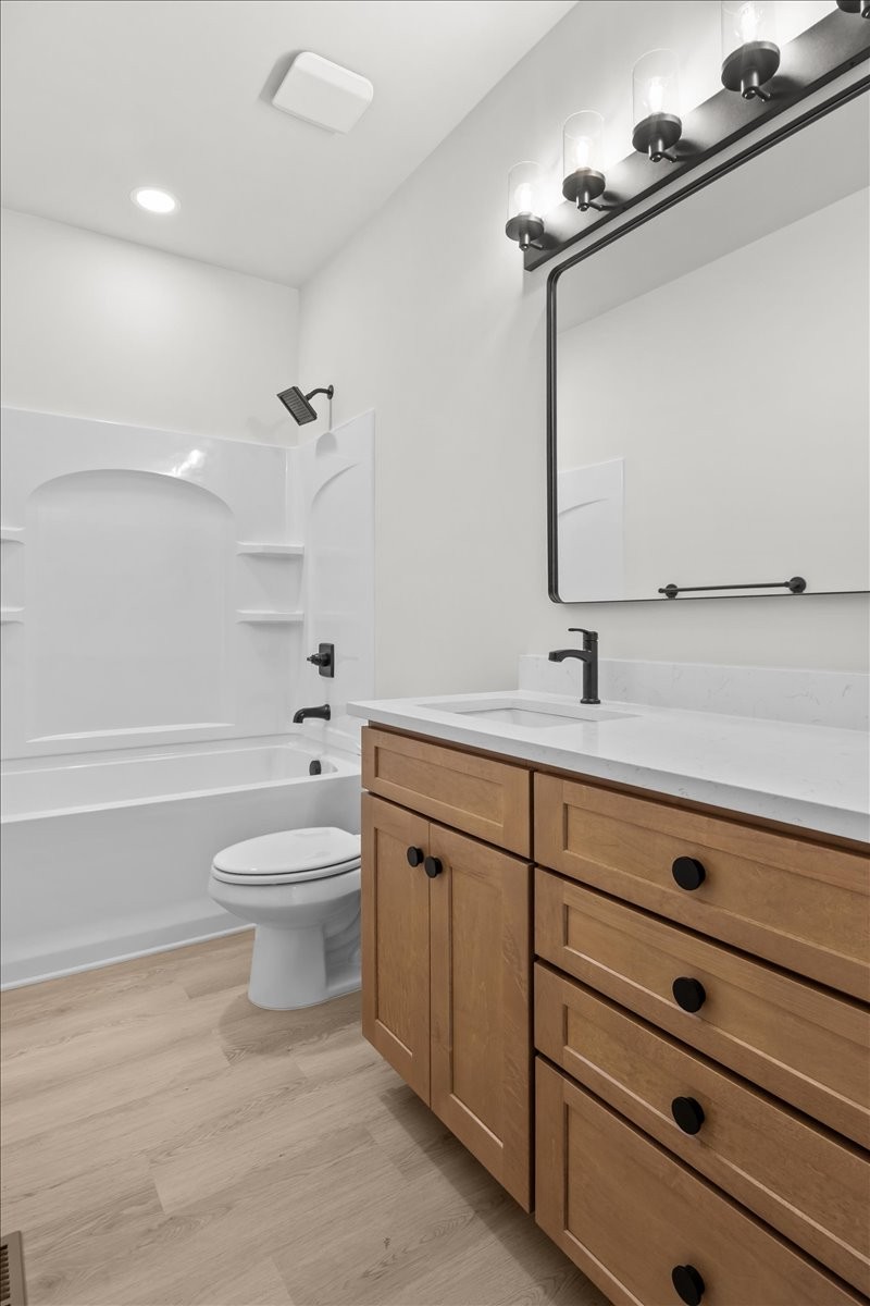 591 Fire Tower Road Dickson, TN 37055 - Photo 21 of 24 a bathroom with a sink a toilet and mirror