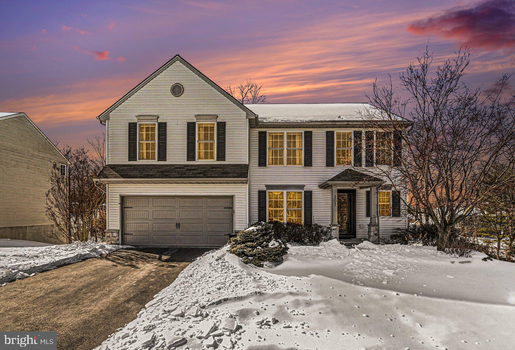 Charming home under a winter sunset glow.