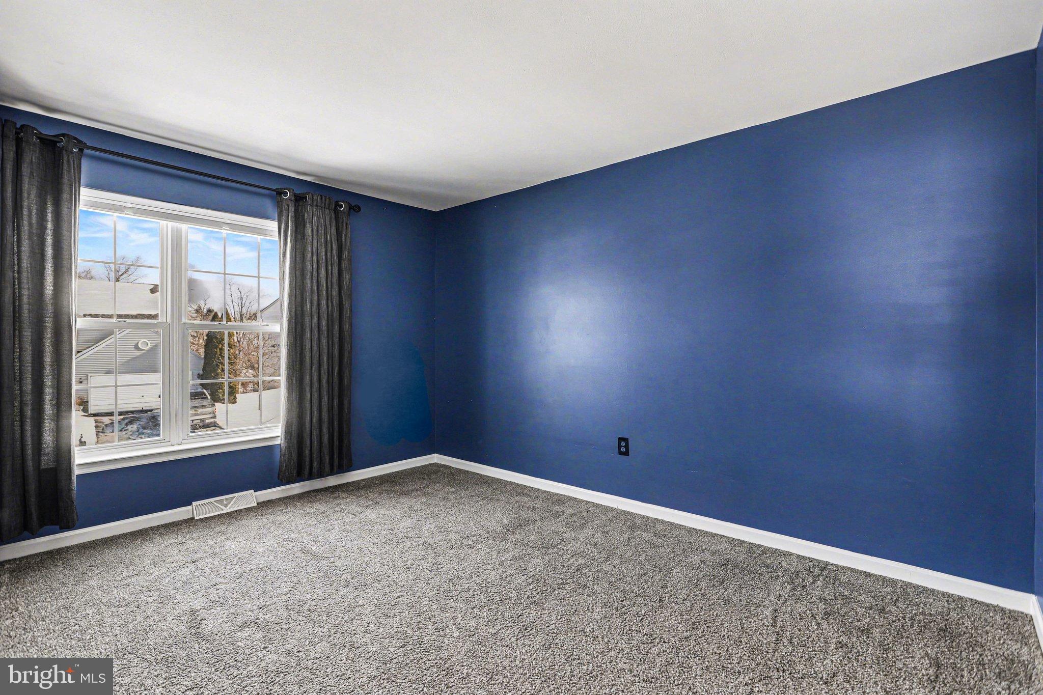 207 Edenderry Way Enola, PA 17025 - Photo 29 of 40 Serene blue walls invite creativity and calm.