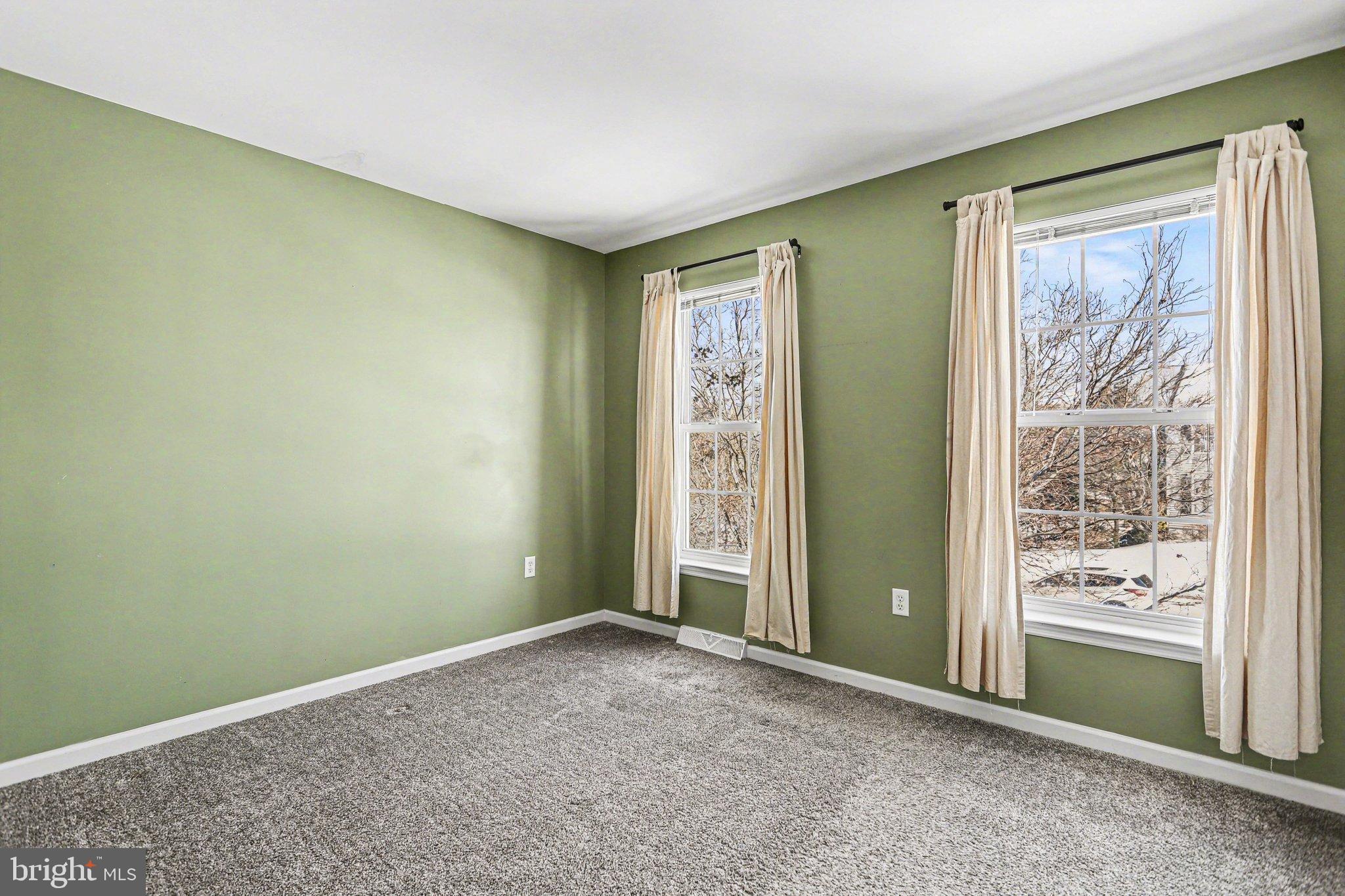 207 Edenderry Way Enola, PA 17025 - Photo 30 of 40 Bright and airy room with fresh green walls.