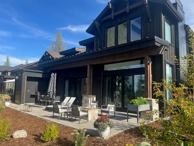 a view of a building with sitting area and porch