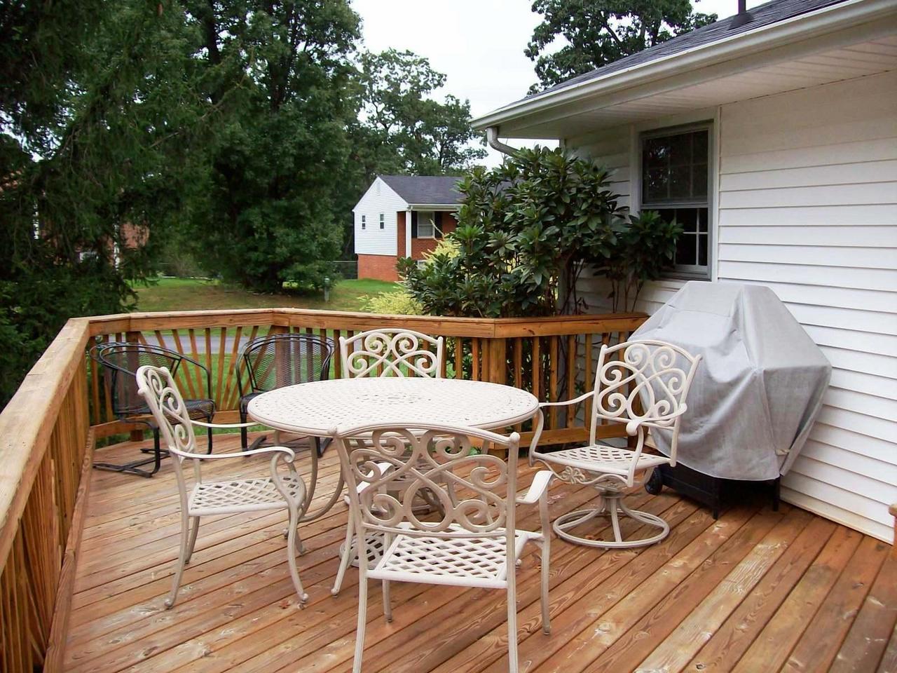 16 Persimmon Court Blue Ridge, VA 24064 - Photo 8 of 10 a view of outdoor space yard deck patio and fire pit