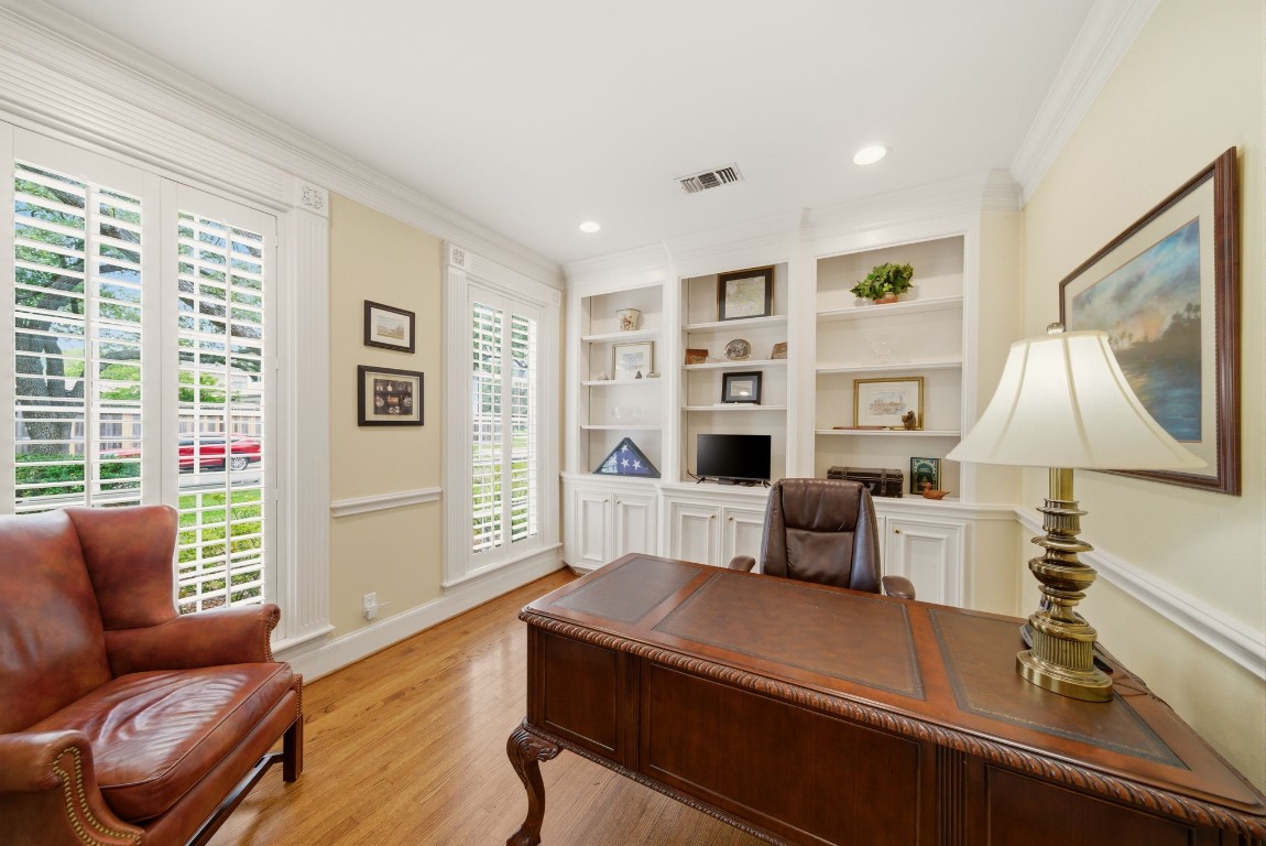 3 Martin Lane Spring Valley Village, TX 77055 - Photo 2 of 32 Handsome Study with hardwood floors, built ins and plantation shutters. Lovely window casings throughout.