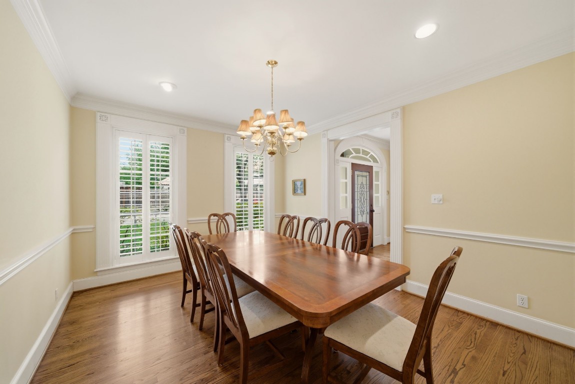 3 Martin Lane Spring Valley Village, TX 77055 - Photo 4 of 32 Nice sized formal Dining Room features hardwood floors, chair rail molding and plantation shutters.
