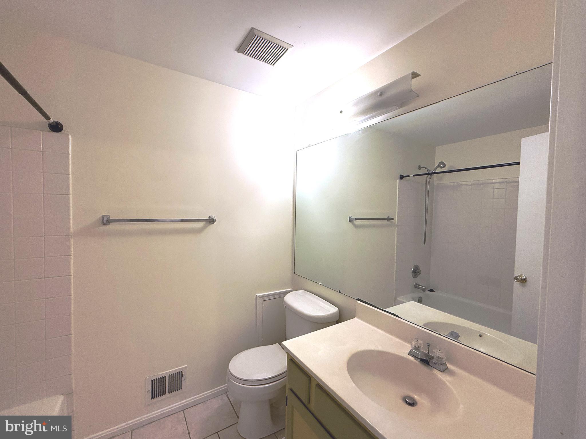 11 Wimbledon Court Silver Spring, MD 20906 - Photo 16 of 21 a bathroom with a sink toilet and shower