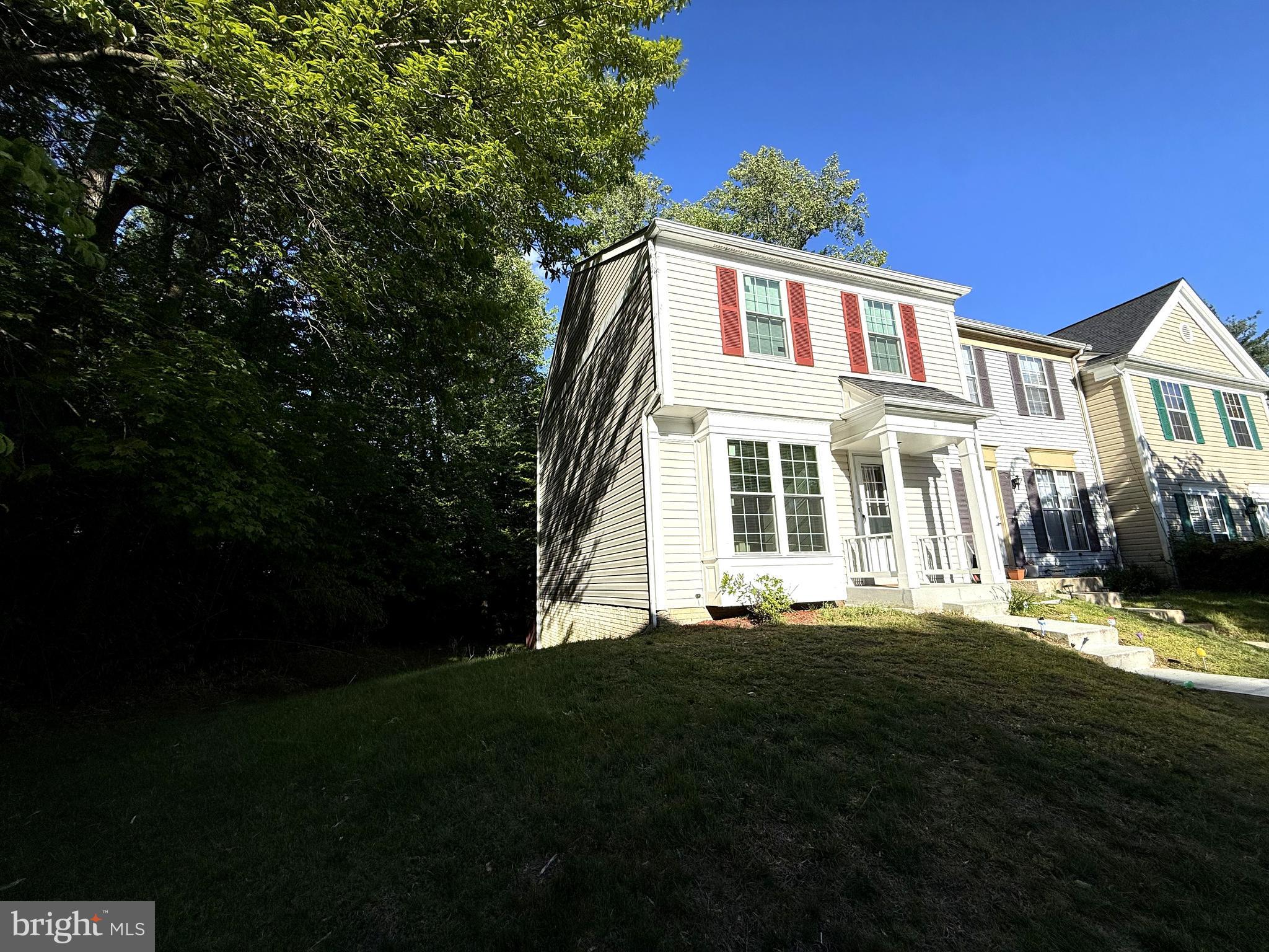 11 Wimbledon Court Silver Spring, MD 20906 - Photo 2 of 21 a front view of a house with a garden
