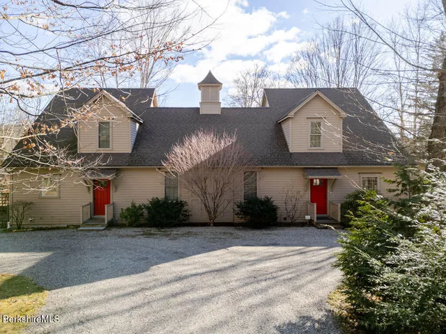 a front view of house with a yard
