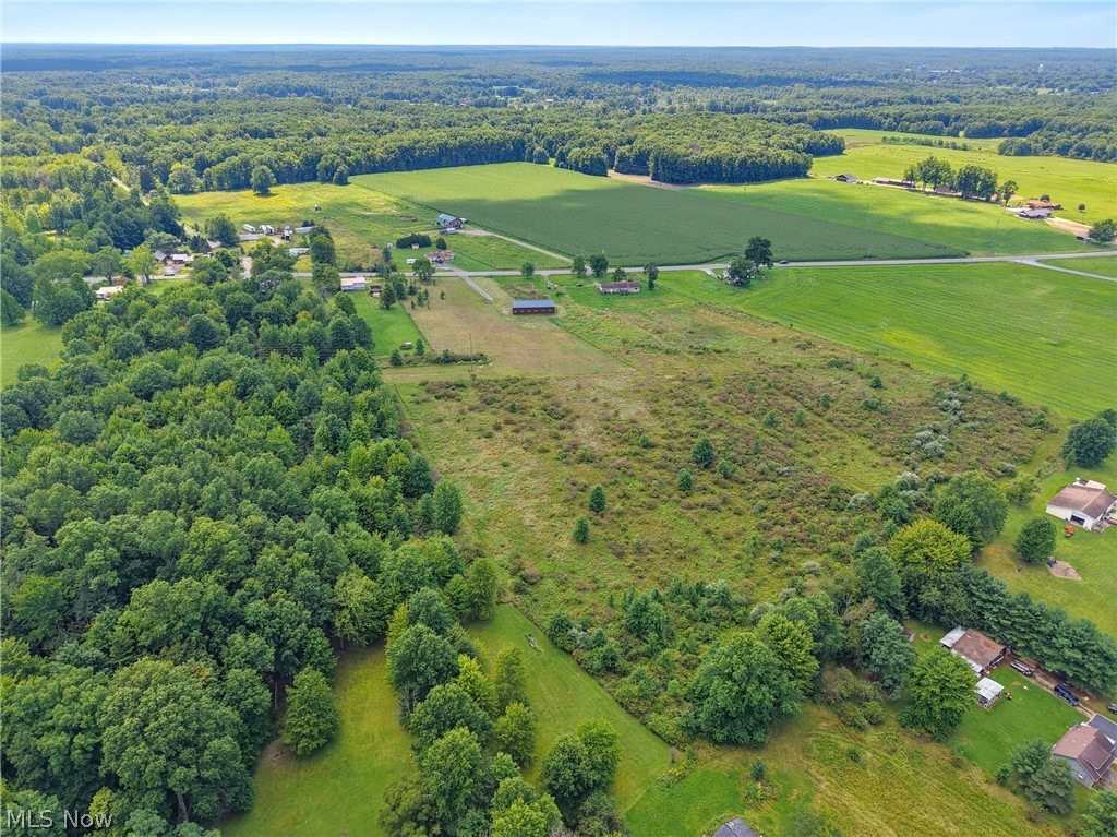 82 State Route Newton Falls, OH 44444 - Photo 21 of 30 Expansive acreage featuring a mix of cleared land, wooded areas, and agricultural fields