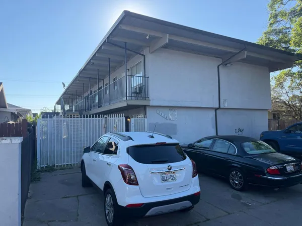 a car parked in front of a house