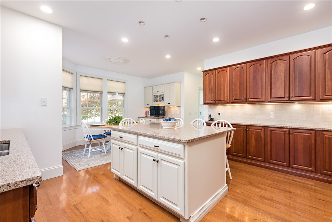 8 Kettle Cl Westerly, RI 02891 - Photo 11 of 39 The kitchen features hardwood floors and upscale cabinetry