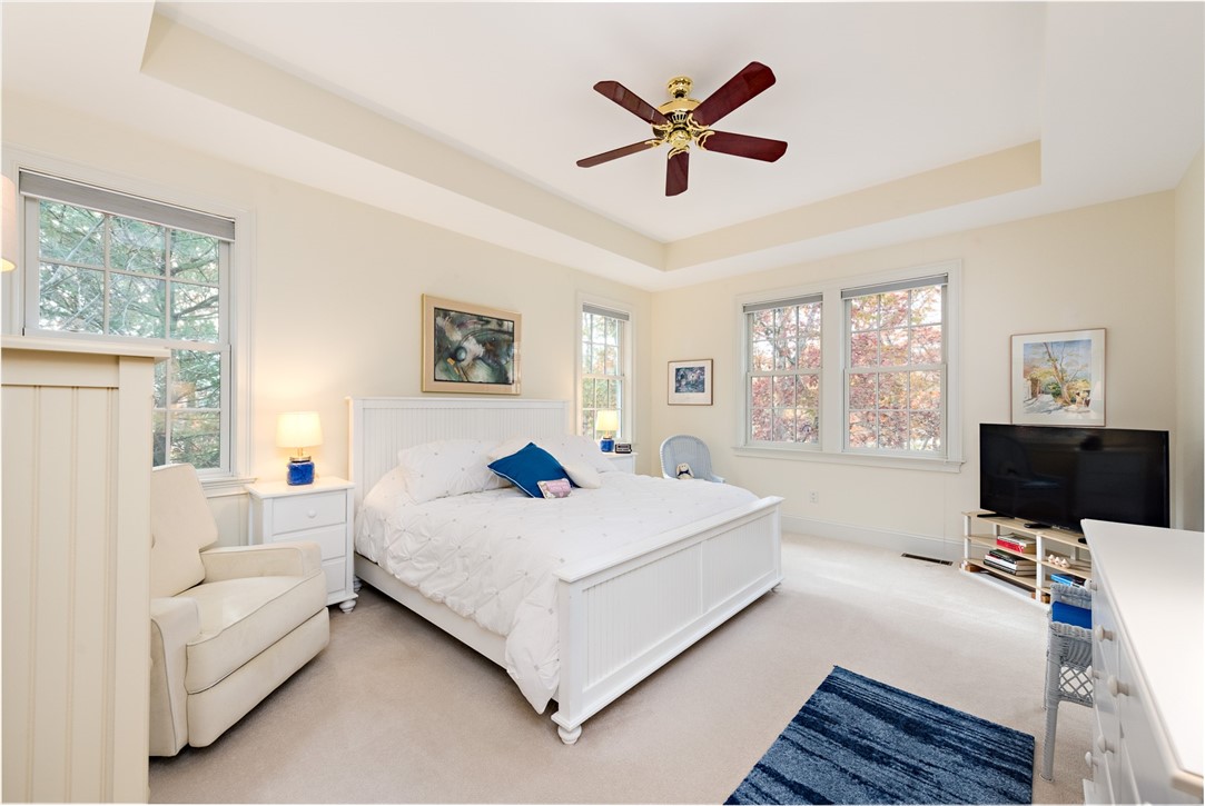 8 Kettle Cl Westerly, RI 02891 - Photo 18 of 39 A large tray ceilinged main bedroom is on the main level.