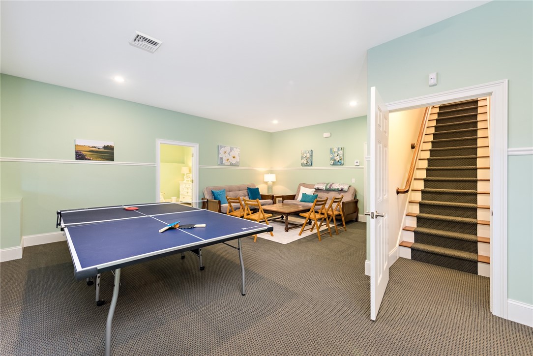 8 Kettle Cl Westerly, RI 02891 - Photo 26 of 39 Lower level game room is set up to provide fun for houseguests.