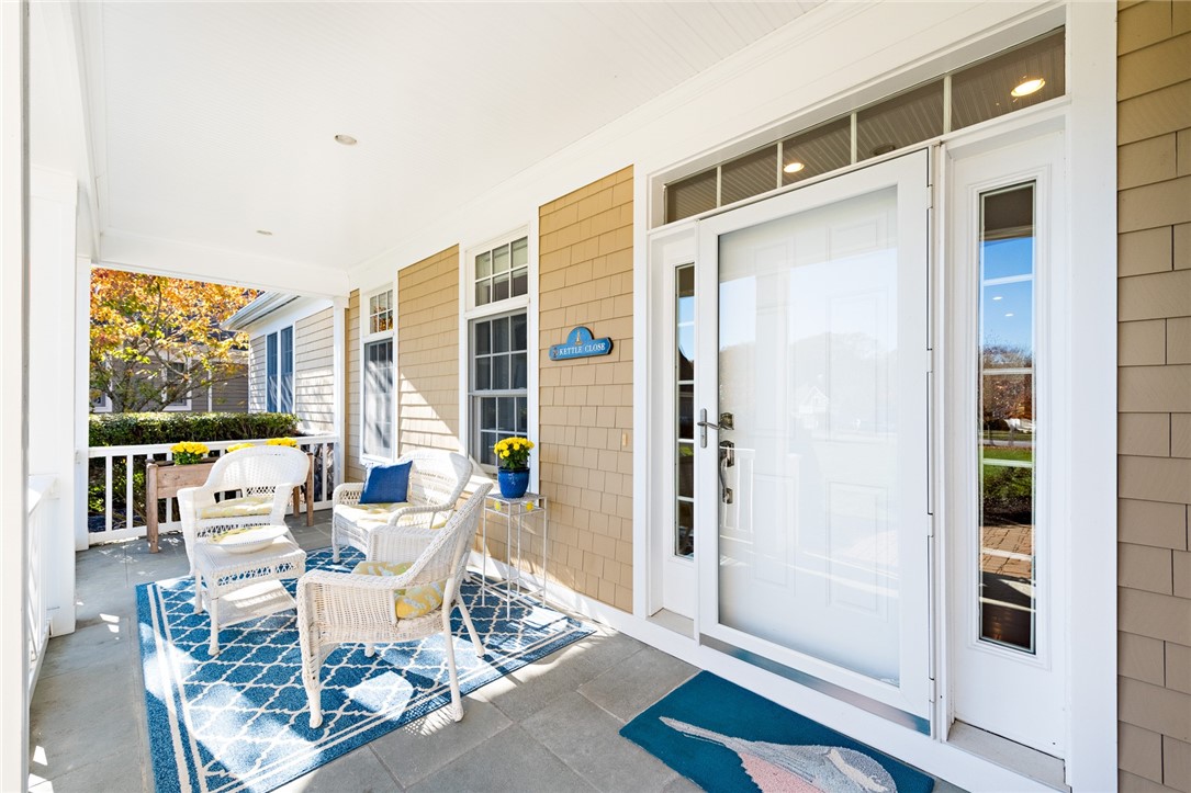 8 Kettle Cl Westerly, RI 02891 - Photo 34 of 39 The front porch serves as a quiet respite to enjoy coffee