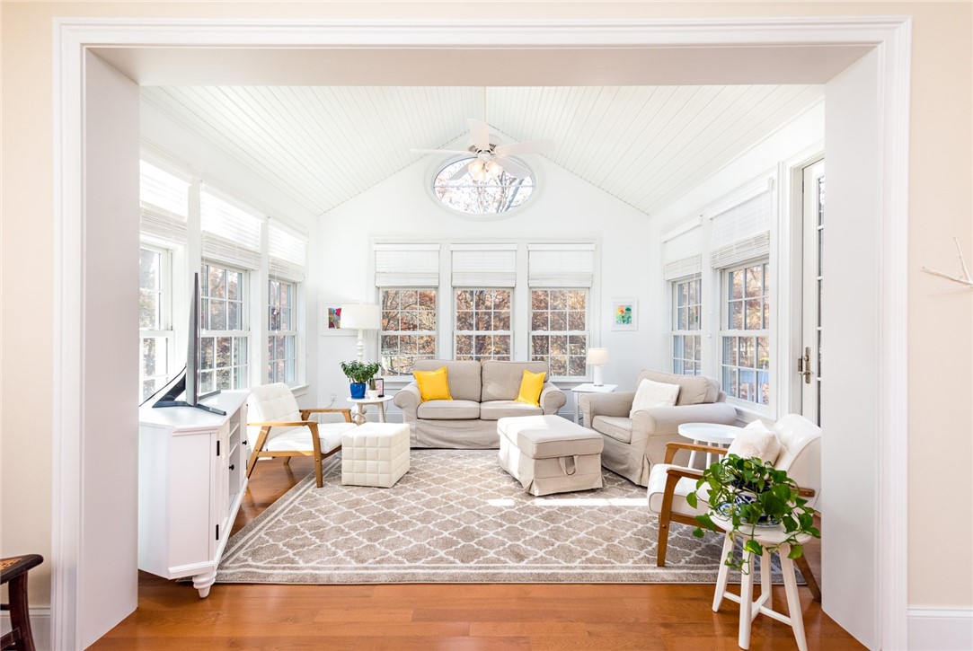 8 Kettle Cl Westerly, RI 02891 - Photo 8 of 39 Bright and cheery sunroom with a vaulted ceiling.