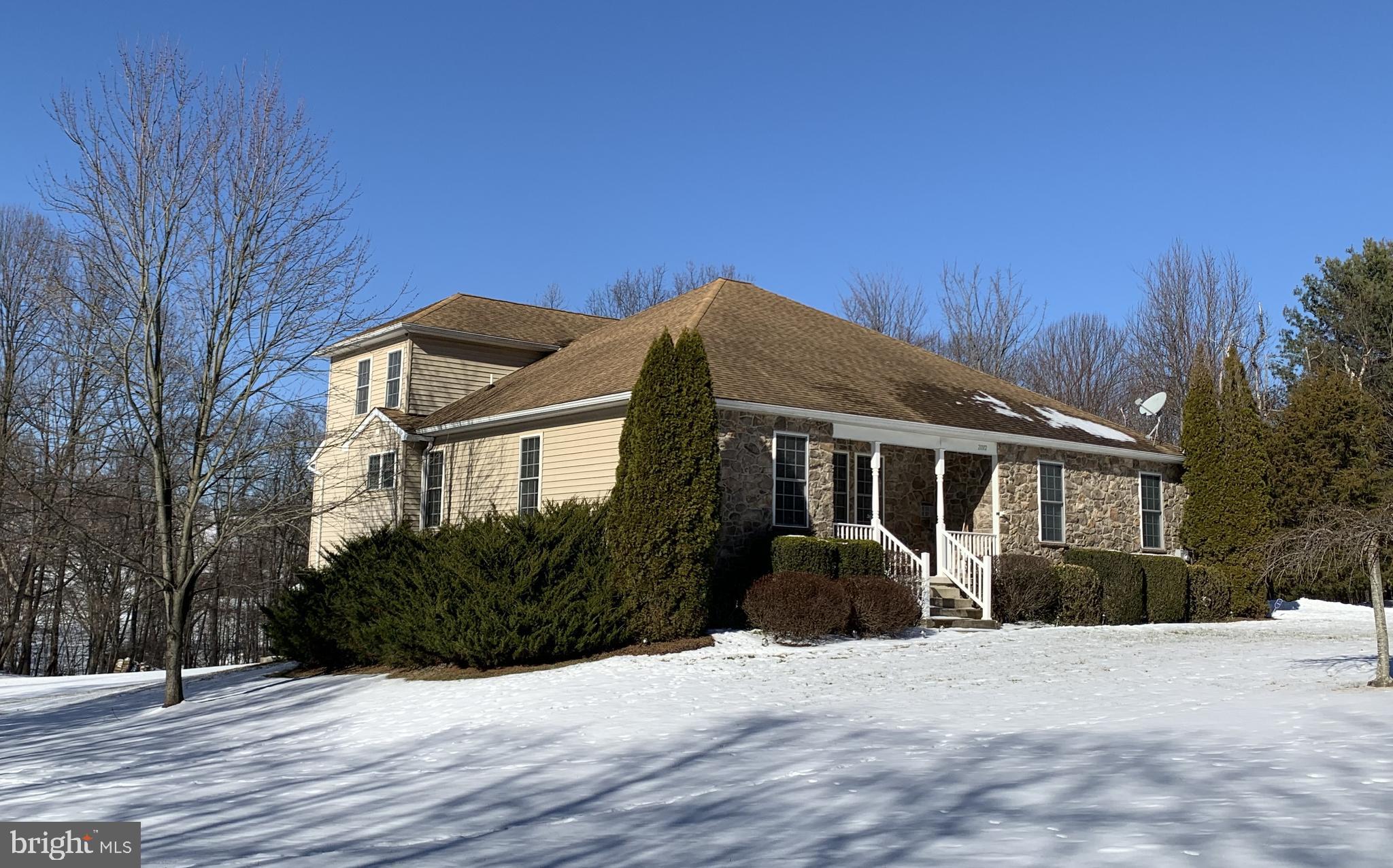 21112 Park Hall Road Boonsboro, MD 21713 - Photo 1 of 39 a front view of house with yard and trees in the background