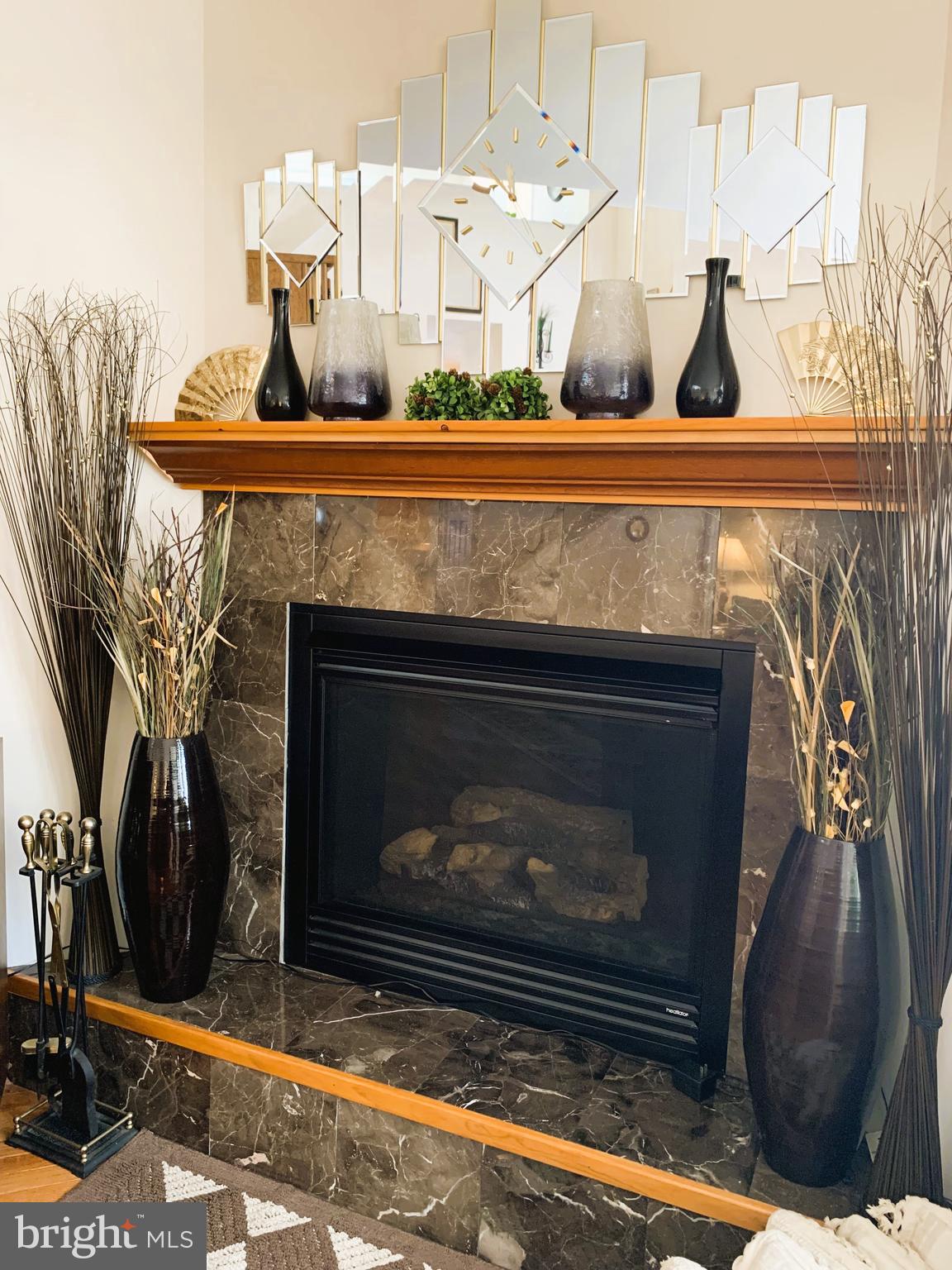 21112 Park Hall Road Boonsboro, MD 21713 - Photo 27 of 39 a fireplace sitting on top of a kitchen
