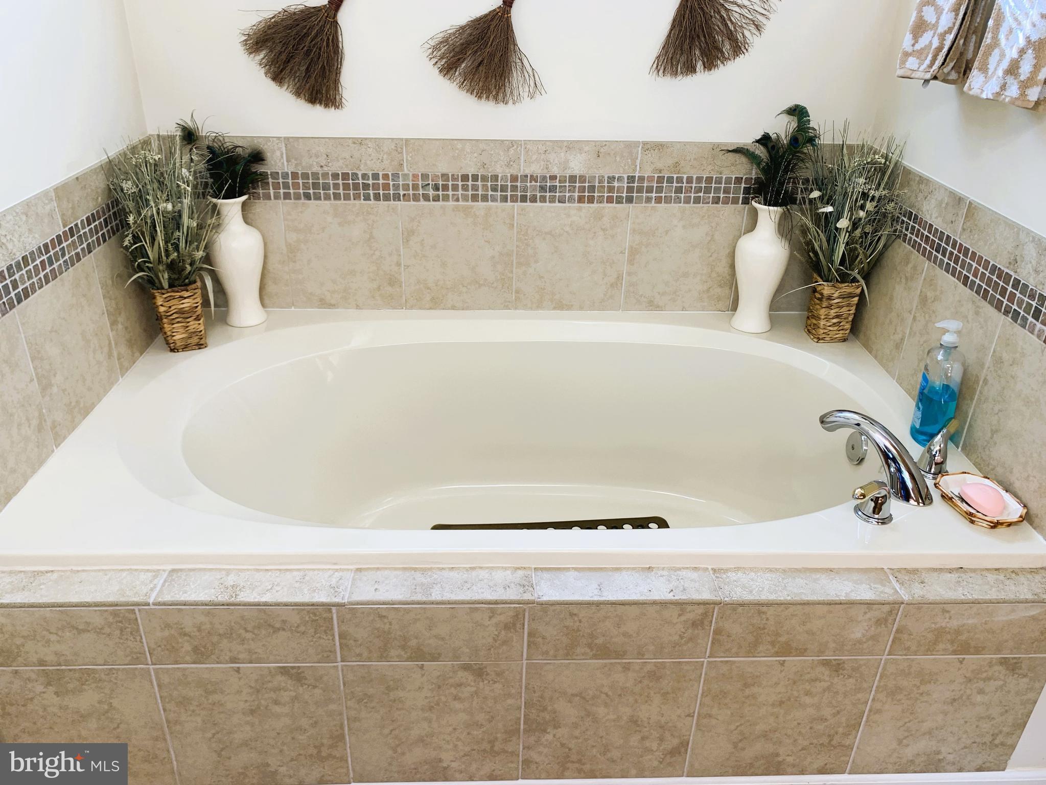 21112 Park Hall Road Boonsboro, MD 21713 - Photo 33 of 39 a white bath tub sitting in a bathroom