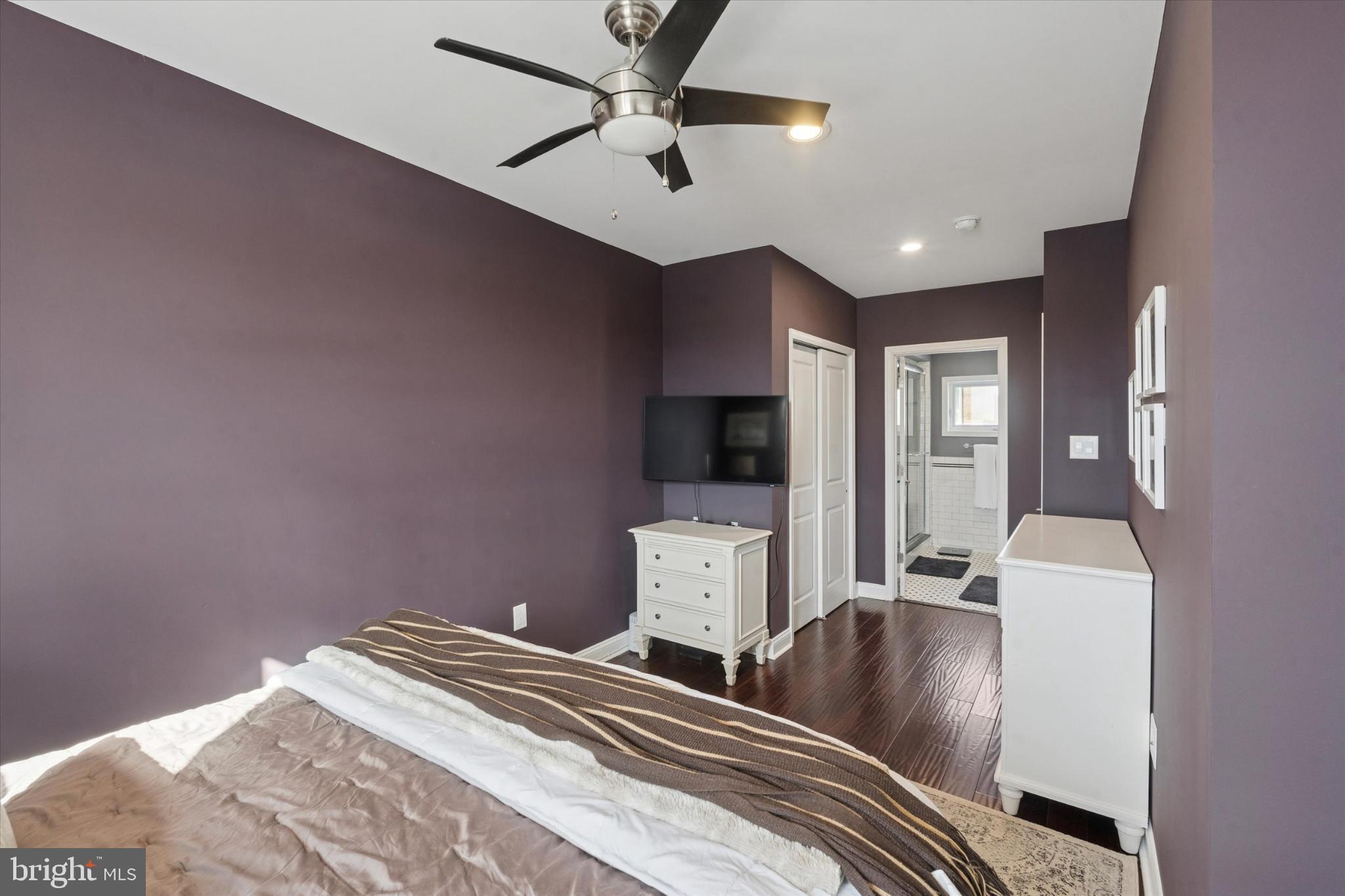 1933 Wilder Street Philadelphia, PA 19146 - Photo 16 of 24 Cozy bedroom with rich purple walls.