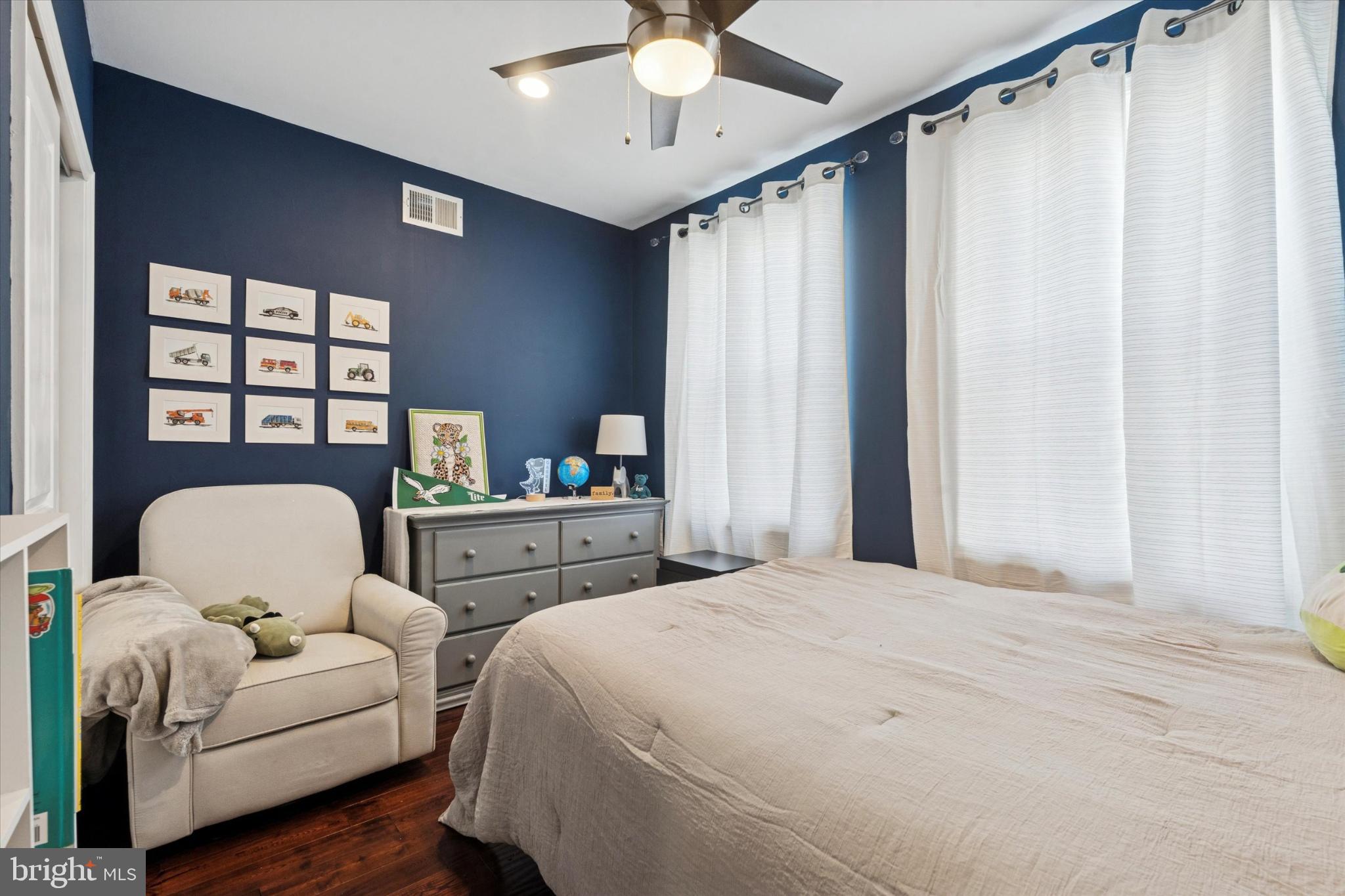1933 Wilder Street Philadelphia, PA 19146 - Photo 8 of 24 Cozy bedroom with navy accent wall.