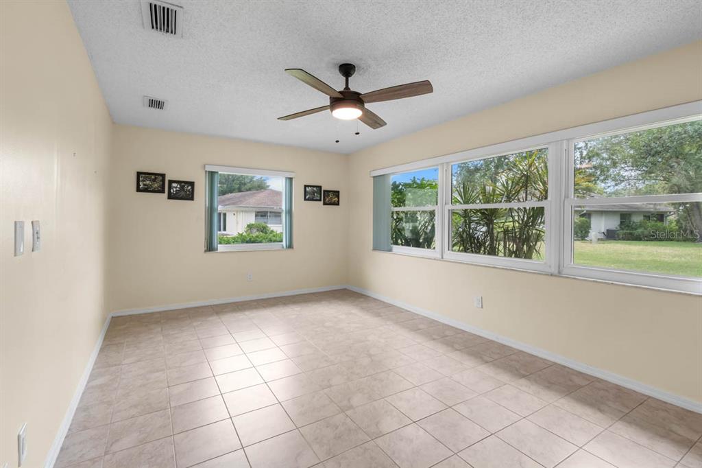 2034 Hawkhurst Circle, Unit 178 Sun City Center, FL 33573 - Photo 32 of 46 a view of an empty room with a window