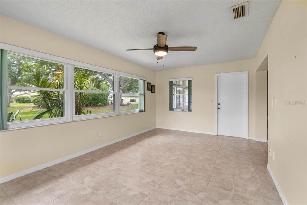 2034 Hawkhurst Circle, Unit 178 Sun City Center, FL 33573 - Photo 33 of 46 a view of an empty room with a window