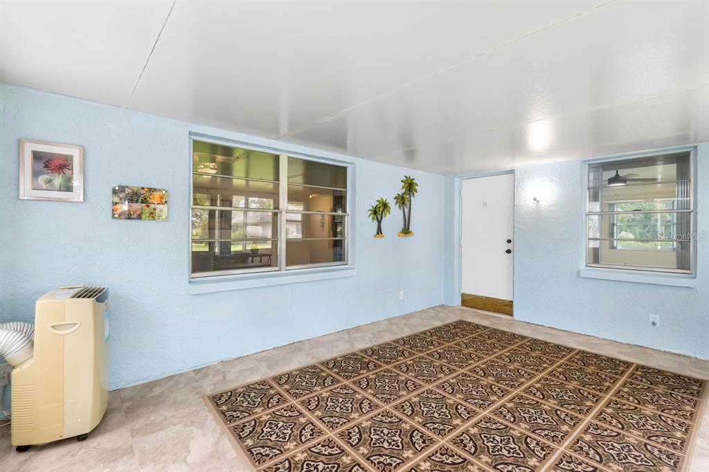 2034 Hawkhurst Circle, Unit 178 Sun City Center, FL 33573 - Photo 35 of 46 a view of an empty room with a window