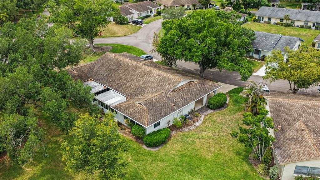 2034 Hawkhurst Circle, Unit 178 Sun City Center, FL 33573 - Photo 4 of 46 an aerial view of a house with a yard basket ball court and outdoor seating