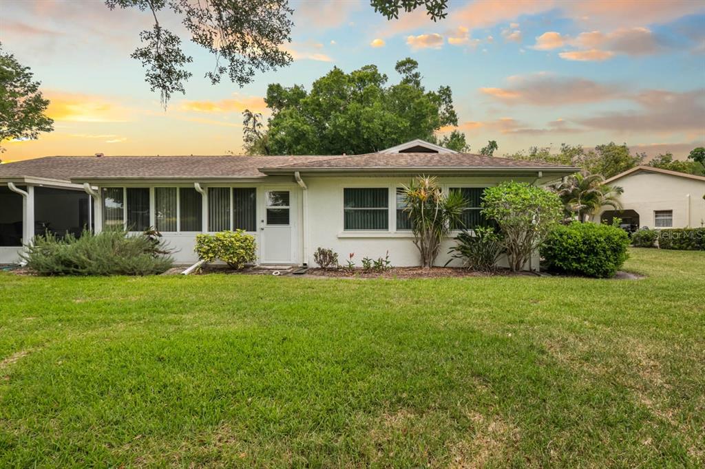 2034 Hawkhurst Circle, Unit 178 Sun City Center, FL 33573 - Photo 44 of 46 a view of a house with backyard and garden