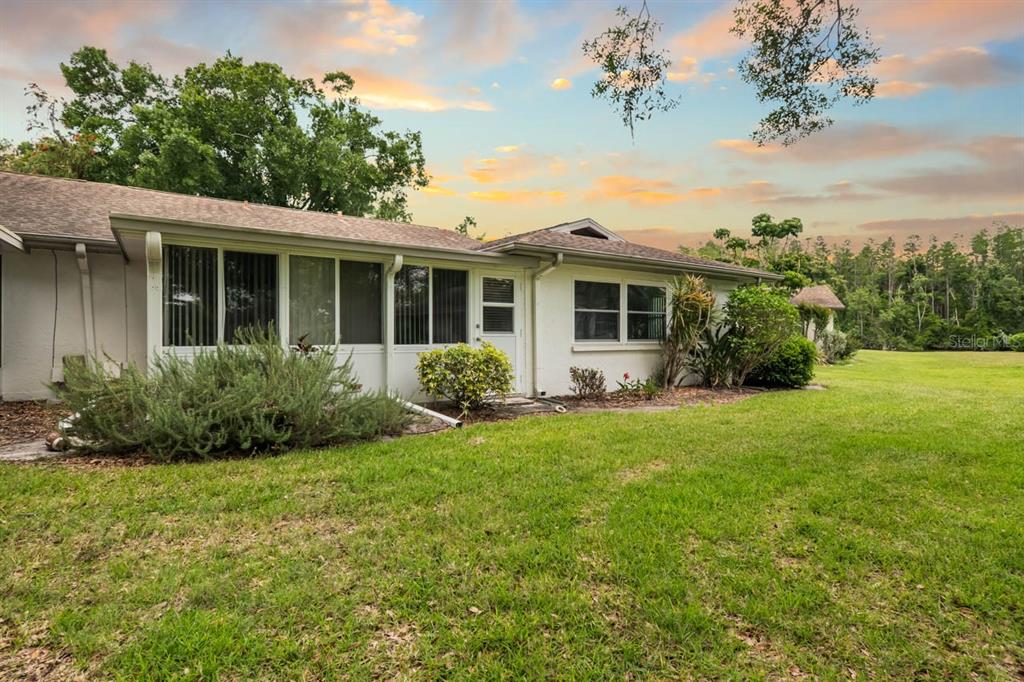 2034 Hawkhurst Circle, Unit 178 Sun City Center, FL 33573 - Photo 46 of 46 a view of a house with backyard and garden